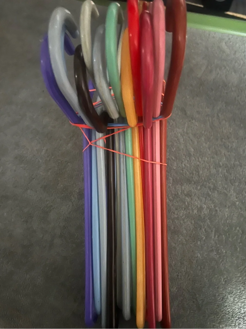Bundle of Colorful Plastic Hangers - Pink, White, Yellow, Blue. Bundle of 12